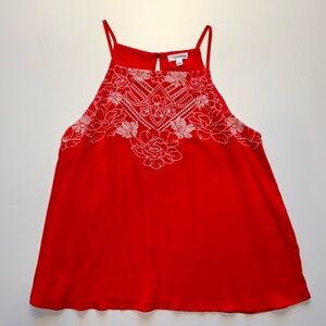 Red sleeveless top